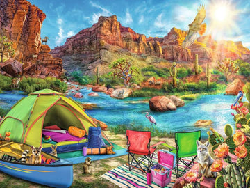 A vibrant jigsaw puzzle featuring a picturesque canyon camping scene. A green tent is set up next to a clear blue river, surrounded by colorful wildflowers and cacti. Nearby, two camping chairs in red and green are positioned next to a pink cooler, while raccoons and a fox explore the area. The backdrop features stunning rock formations and a bright sky, encapsulating the beauty of nature.