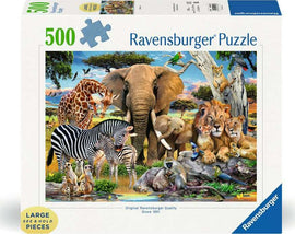 A colorful 500-piece jigsaw puzzle by Ravensburger titled 'Baby Love.' The puzzle features a vibrant wildlife scene filled with various animals, including a giraffe, elephant, zebra, lions, monkeys, and tropical birds in a natural setting. The packaging highlights the large, easy-to-handle puzzle pieces. Perfect for family fun and animal lovers.