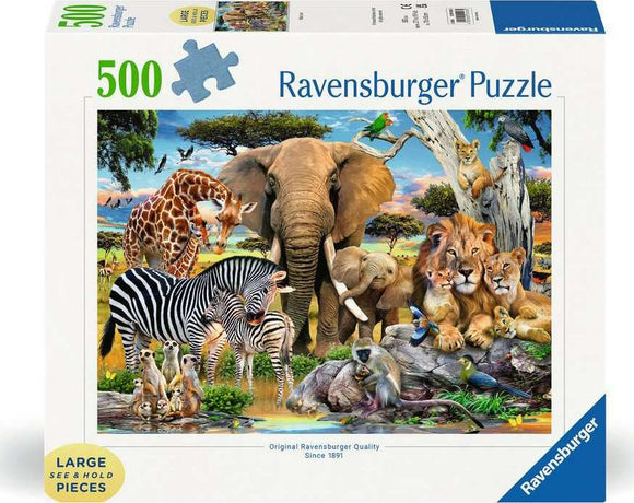 A colorful 500-piece jigsaw puzzle by Ravensburger titled 'Baby Love.' The puzzle features a vibrant wildlife scene filled with various animals, including a giraffe, elephant, zebra, lions, monkeys, and tropical birds in a natural setting. The packaging highlights the large, easy-to-handle puzzle pieces. Perfect for family fun and animal lovers.