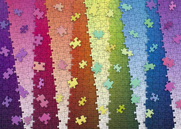 A vibrant jigsaw puzzle titled 'Karen Puzzles: Colors on Color' featuring an array of colorful pieces arranged in gradient hues from purple to blue. Some pieces are scattered across the image, showcasing the puzzle's intricate design and playful color palette, perfect for art enthusiasts and puzzle lovers.