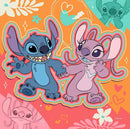 A colorful jigsaw puzzle featuring Stitch and Angel from Disney's Lilo & Stitch, depicted in a vibrant, playful style with a mixed background of hearts and flowers. The characters are smiling and holding hands, showcasing their friendship.