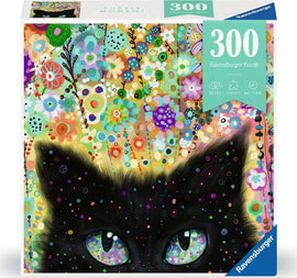 The Kaleidoscope Kitty jigsaw puzzle by Ravensburger features a vivid illustration of a black cat's face with large, colorful eyes. The background is filled with a variety of brightly colored flowers and abstract patterns, creating a vibrant and cheerful scene. The puzzle contains 300 pieces and is designed to provide a relaxing and enjoyable experience.