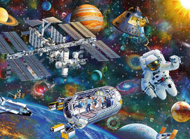 A vibrant jigsaw puzzle featuring a cosmic exploration scene with an astronaut floating in space, spacecraft, satellites, and planets like Jupiter and Saturn in a colorful galaxy backdrop. The 200-piece puzzle invites an adventurous journey through outer space, perfect for both children and adults.