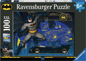 Batman 100-piece jigsaw puzzle by Ravensburger featuring a colorful illustration of Batman alongside blueprints of the Batmobile. The box emphasizes 'XXL' size, indicating larger puzzle pieces suited for ages 6 and up. The design showcases vibrant colors and iconic Batman symbols, perfect for fans of the superhero.