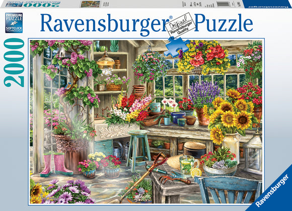 Gardener's Paradise 2000-piece jigsaw puzzle by Ravensburger featuring a vibrant garden scene. The image shows a cozy potting shed filled with colorful flowers, pots, and gardening tools, with a large window letting in sunlight.
