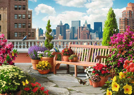 A vibrant rooftop garden scene featuring a wooden bench surrounded by colorful flower pots. The garden includes blooming flowers in various shades, including red, yellow, and purple, and is set against a backdrop of tall city buildings and a blue sky with fluffy clouds. Butterflies and birds are present, adding to the lively atmosphere.