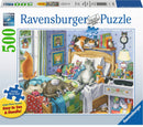 A 500-piece jigsaw puzzle titled 'Cat Nap' by Ravensburger, featuring a cozy bedroom scene filled with various cats lounging on a bed, with colorful decorations and a warm ambiance. The puzzle package showcases the artistic illustration, emphasizing the large piece format for easy handling.