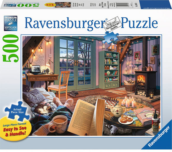 The Cozy Retreat 500-piece jigsaw puzzle by Ravensburger features a serene indoor scene. A cozy living room with a crackling fireplace, a wooden table holding books and snacks, a chair by a large window, and soft plush furnishings set a warm atmosphere. Various decorative items, including lanterns and a chess set, enhance the inviting ambiance. The puzzle is designed with large pieces for easy handling.