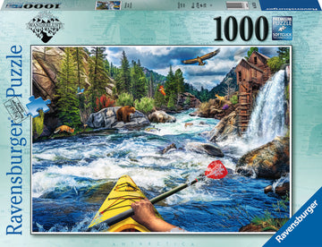 A colorful jigsaw puzzle box featuring a serene whitewater kayaking scene. The image shows a kayaker with a yellow kayak paddling through turbulent waters, surrounded by lush trees, wildlife including bears and eagles, and a picturesque waterfall spilling from a rustic wooden cabin. The puzzle has 1000 pieces and is designed for nature and adventure lovers.
