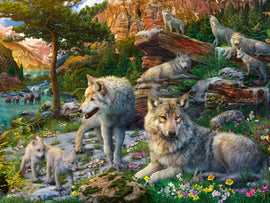 A vibrant 1500-piece jigsaw puzzle featuring a scenic wilderness landscape inhabited by majestic wolves. The image depicts adult wolves alongside playful wolf pups amidst colorful flowers, a flowing waterfall, and a serene lake with bears in the background, showcasing nature's beauty and wildlife diversity.