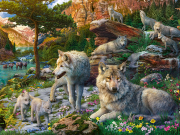 A vibrant 1500-piece jigsaw puzzle featuring a scenic wilderness landscape inhabited by majestic wolves. The image depicts adult wolves alongside playful wolf pups amidst colorful flowers, a flowing waterfall, and a serene lake with bears in the background, showcasing nature's beauty and wildlife diversity.