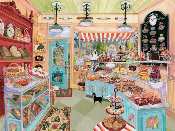 A vibrant jigsaw puzzle featuring an inviting corner bakery scene. The interior showcases a variety of baked goods, including breads, pastries, and cakes, displayed in glass cases. A decorative rug lies on the floor, and a small black dog stands near the display. The bakery has colorful walls, hanging lights, and a charming door leading to a sunny view outside.
