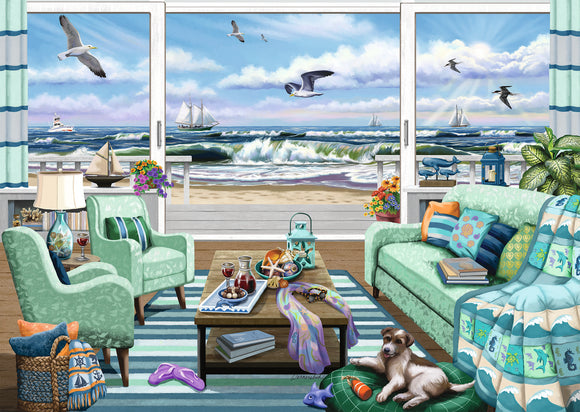 A cozy beachfront living room with two green armchairs and a coffee table. The table holds snacks and drinks. Through large windows, a beautiful ocean view features waves, sailboats, and seagulls. A playful dog rests on the floor, and colorful decor enhances the inviting ambiance.