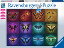 Ravensburger 1000 pc jigsaw puzzle titled 'Winged Things.' The puzzle features a colorful collection of butterflies, insects, and dragonflies arranged in a decorative grid, each against ornate backgrounds in various colors.