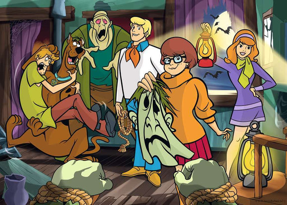 Scooby Doo Unmasking 1000 piece jigsaw puzzle featuring famous characters from the series including Scooby Doo, Shaggy, Velma, Daphne, and Fred. The group is inside a spooky setting with a ghost and lanterns, creating an adventurous scene.