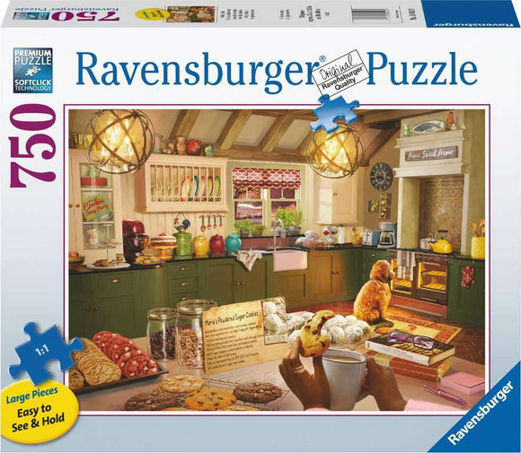 A 750-piece jigsaw puzzle featuring a cozy kitchen scene. The image depicts a warm and inviting kitchen with colorful utensils and baked goods. A dog sits contentedly by the oven, while a person enjoys a cup of coffee amidst the delightful cookies and pastries on the table, creating a heartwarming atmosphere for puzzle enthusiasts.