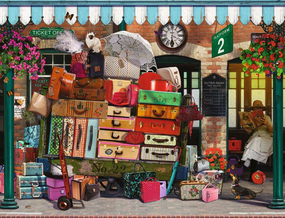 A colorful 2000-piece jigsaw puzzle titled 'Traveling Light' by Ravensburger, depicting a charming scene of a luggage cart overflowing with various vintage suitcases, bags, and lovely details like flowers, a cat, and a person reading a book at a train station. The artwork features detailed textures and bright colors, creating a whimsical travel theme.