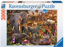 The African Animal World jigsaw puzzle by Ravensburger features a vibrant scene filled with a variety of wildlife, including elephants, zebras, giraffes, and rhinos in a lush, natural setting. The puzzle includes 3000 pieces and showcases intricate details of the animals amidst a serene water landscape and tropical plants.
