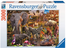 The African Animal World jigsaw puzzle by Ravensburger features a vibrant scene filled with a variety of wildlife, including elephants, zebras, giraffes, and rhinos in a lush, natural setting. The puzzle includes 3000 pieces and showcases intricate details of the animals amidst a serene water landscape and tropical plants.