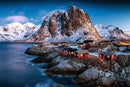 A beautiful jigsaw puzzle featuring the stunning landscape of Hamnoy, Lofoten. The image showcases picturesque red fishing cabins set against majestic snow-capped mountains and a serene fjord under a clear blue sky.