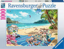 A scenic jigsaw puzzle titled 'The Shell Collector' featuring a beautiful beach scene. The image shows a variety of colorful shells and beach accessories laid out on a vibrant blue towel, with lush palm trees and the ocean in the background. A lighthouse can be seen in the distance, adding charm to this serene coastal setting. This Ravensburger puzzle consists of 1000 pieces, perfect for hobbyists seeking a relaxing challenge.