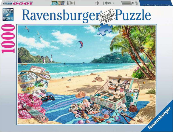 A scenic jigsaw puzzle titled 'The Shell Collector' featuring a beautiful beach scene. The image shows a variety of colorful shells and beach accessories laid out on a vibrant blue towel, with lush palm trees and the ocean in the background. A lighthouse can be seen in the distance, adding charm to this serene coastal setting. This Ravensburger puzzle consists of 1000 pieces, perfect for hobbyists seeking a relaxing challenge.
