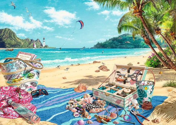 A vibrant and detailed jigsaw puzzle image featuring a beach scene with a sandy shore, palm trees, and ocean waves. The foreground showcases a colorful blanket laid out with seashells, sunglasses, jewelry, and a decorated box filled with treasures. In the background, there are boats, a lighthouse, and a clear blue sky, creating a serene coastal atmosphere.