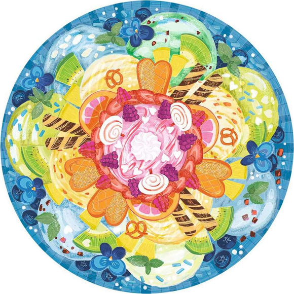 A vibrant 500-piece round jigsaw puzzle featuring a colorful illustration of various ice cream flavors and toppings arranged in a visually appealing circular pattern. The puzzle showcases scoops of ice cream in shades of green, yellow, pink, and orange, surrounded by cones, mint leaves, and decorative sprinkles on a blue background.