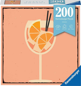 A 200-piece jigsaw puzzle from Ravensburger titled 'Puzzle Moments: Drinks'. The image features a stylized illustration of a cocktail glass filled with orange slices on a soft peach background. Includes a light blue banner indicating it's a Ravensburger puzzle, emphasizing relaxation and me-time.
