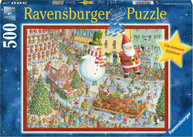 Colorful jigsaw puzzle box featuring a festive Christmas scene with Santa Claus, a snowman, and holiday celebrations. The illustration shows a lively parade with decorated trees, reindeer, and cheerful crowds, suitable for puzzle enthusiasts of all ages. 500 pieces to assemble for a joyful holiday experience.