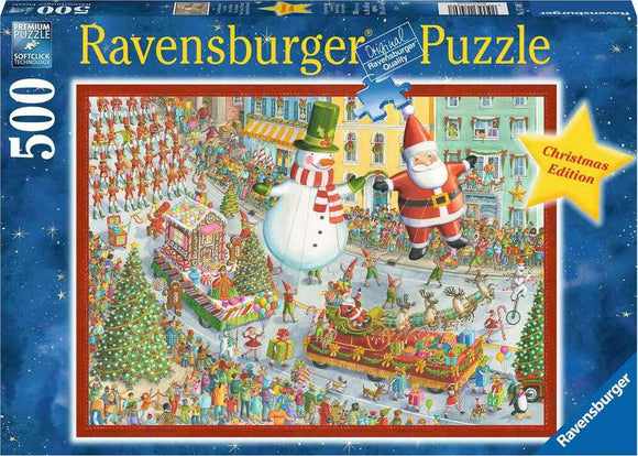 Colorful jigsaw puzzle box featuring a festive Christmas scene with Santa Claus, a snowman, and holiday celebrations. The illustration shows a lively parade with decorated trees, reindeer, and cheerful crowds, suitable for puzzle enthusiasts of all ages. 500 pieces to assemble for a joyful holiday experience.