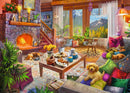 A cozy cabin living room featuring a stone fireplace with a warm fire, surrounded by plants and colorful cushions. A coffee table is set with tea, desserts, and books. Two dogs are comfortably resting in the scene, while vibrant artwork is displayed on the walls and a scenic view is visible through large windows, creating a welcoming atmosphere perfect for puzzle lovers.