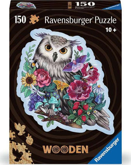 Wooden jigsaw puzzle featuring a beautifully illustrated owl surrounded by vibrant flowers, butterflies, and mushrooms. The puzzle contains 150 pieces and is suitable for ages 10 and up. The packaging displays the Ravensburger logo and highlights the artistic design and quality of the puzzle.