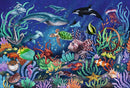 A vibrant 500-piece Ravensburger jigsaw puzzle titled 'WOOD: Under the Sea'. The artwork features a colorful underwater scene filled with various sea creatures including a whale, dolphin, turtle, fish, octopus, and jellyfish, surrounded by lush corals and an anchor.