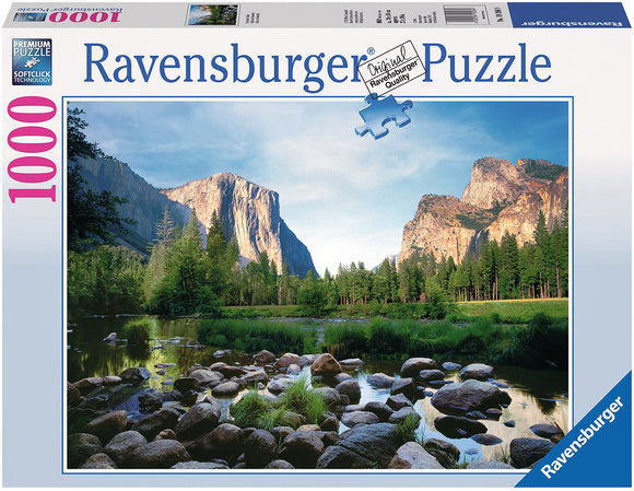 Yosemite Valley jigsaw puzzle featuring a scenic landscape with towering mountains and a serene river. The puzzle contains 1000 pieces and is made by Ravensburger, known for high-quality puzzles. The box showcases the picturesque view of Yosemite, highlighting the natural beauty and intricate details of the scene.