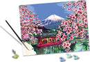 CreArt Japanese Cherry Blossom DIY kit featuring a vibrant image of cherry blossoms in front of a traditional Japanese building and Mt. Fuji in the background. The kit includes a paintbrush, paint pots in various colors, and a pre-printed canvas, making it ideal for art enthusiasts and DIY lovers.
