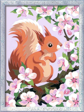 A charming DIY kit titled 'CreArt Spring Squirrel' featuring a whimsical squirrel against a backdrop of blooming flowers. The design showcases vibrant colors and a playful expression, making it an engaging creative project for art enthusiasts.