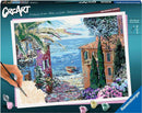 CreArt Mediterranean Landscape DIY kit featuring a hand painting a vibrant Mediterranean scene. The kit includes numbered colors and a detailed canvas, perfect for creating your own artwork.