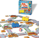 Big City Builders game by Ravensburger featuring colorful construction-themed game pieces. The game includes various road and building tiles, trucks, and a dice on a vibrant play area.