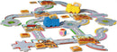 Big City Builders game by Ravensburger, featuring colorful wooden trucks and playful road tiles. The game includes a dice and various construction-themed tiles, allowing players to connect roads and create a bustling city layout, perfect for imaginative play. Ideal for young builders and families.