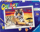CreArt Majestic Tiger DIY art kit featuring a vibrant image of a tiger against a sunset background. Includes paints and canvas for personalized artistry. Suitable for ages 11 and up.