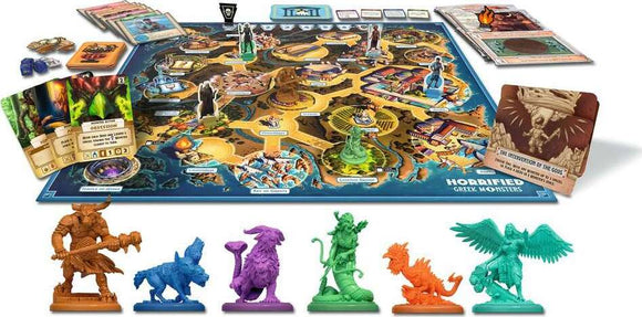 A colorful game set featuring the 'Horrified Greek Monsters' board game by Think Fun. The game includes a large game board depicting Greek landscapes, several monster figurines in vibrant colors, player cards, dice, and adventure tokens laid out ready to play. Notable monsters include a minotaur, a gorgon, and other mythical creatures, all set against a backdrop of ancient architecture and landscapes.