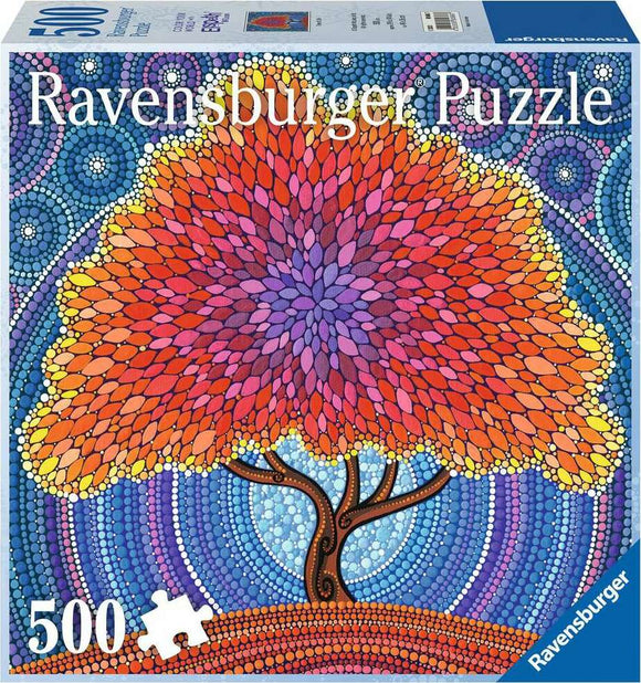 Elspeth McLean's Tree of Life 5 jigsaw puzzle by Ravensburger featuring a colorful, intricate design of a large tree with vibrant leaves in orange, purple, and pink shades, set against a whimsical blue and dotted background. The puzzle contains 500 pieces and is designed for both entertainment and relaxation.