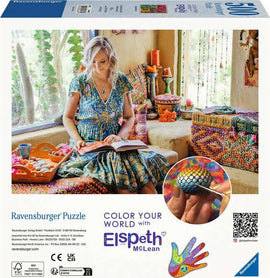 Elspeth McLean: Mandala Blooms jigsaw puzzle by Ravensburger featuring an intricate mandala design with vibrant colors. The product image displays a serene setting with a woman in a stylish dress reading books, surrounded by colorful decorative items and greenery, highlighting creativity and relaxation.