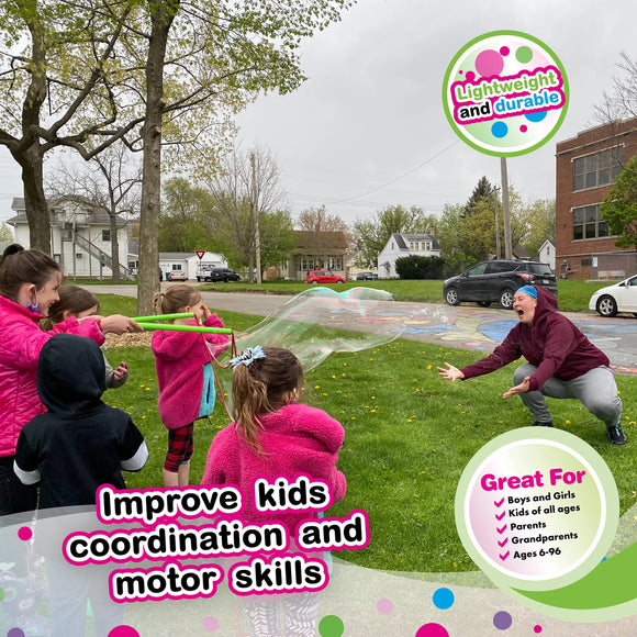 Children playing outdoors with the WOWmazing Grab-n-Go Giant Bubble Kit, creating large bubbles while laughing and having fun. The scene shows kids in colorful jackets, enhancing coordination and motor skills through bubble play.