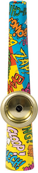 A colorful Krazy Kazoo from Schylling, featuring vibrant pop art designs with words like 'ZAP!' and 'BOOM!' printed on a bright background. The kazoo is shaped like a traditional wind instrument, with a brass-colored mouthpiece and a fun, playful appearance perfect for kids and adults alike.