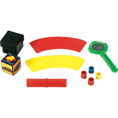 A vibrant assortment of magic tricks including a black box, colorful plastic discs in red, yellow, and green, a magic wand, and other props designed for entertaining performances. Perfect for aspiring magicians, this set encourages creativity and lively play.