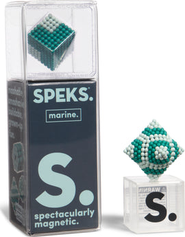 Speks Elements: Marine, a captivating magnetic fidget toy featuring small, colorful spheres in a cube shape with various shades of teal, white, and gray. The packaging is clear with a modern design, highlighting the product's allure and potential for creative play.