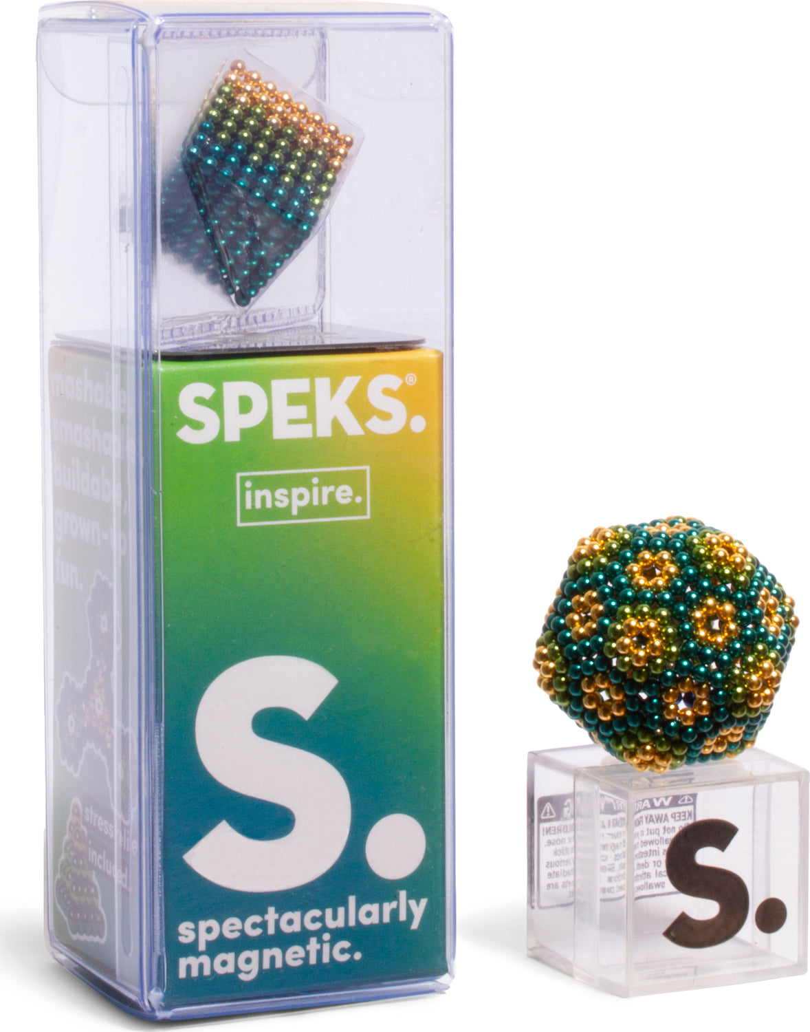 The Speks Inspire Gradient is a colorful magnetic ball toy, featuring vibrant beads in shades of green, gold, and blue. The packaging showcases the product name and highlights its spectacular magnetic properties, ideal for stress relief and creative play. A smaller geometric shape made of the same magnetic beads is displayed next to the box, emphasizing the versatility of the toy.