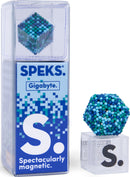 SPEKS Pixel Gigabyte, a colorful magnetic construction kit displayed in its packaging. The kit features a cluster of multicolored spheres arranged in a geometric shape beside a clear base, promoting creativity and tactile play.
